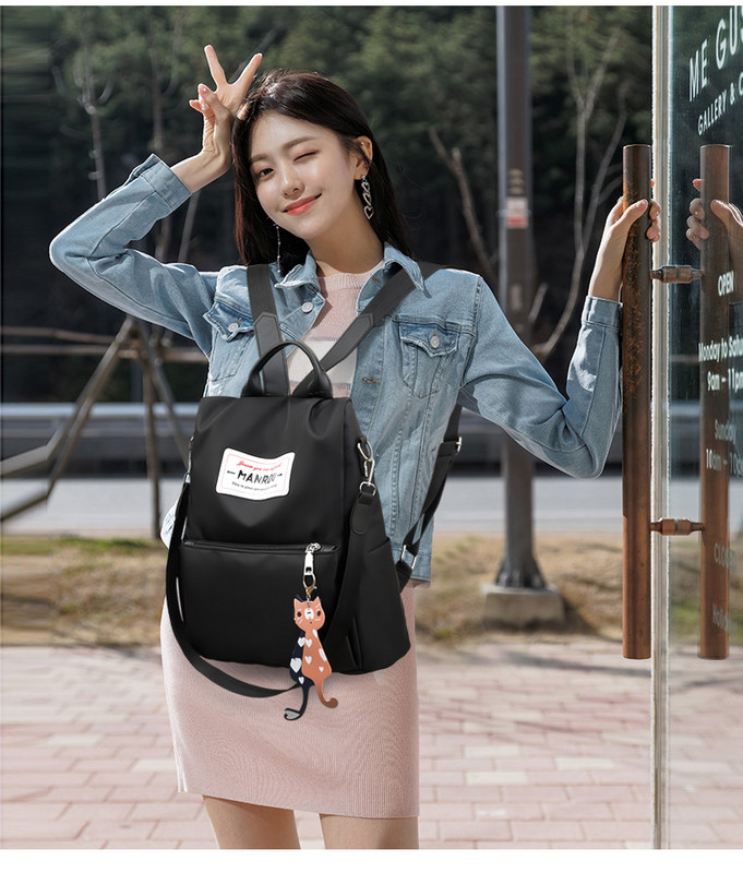 Női alkalmi hátizsák elülső zsebbel és kiegészítővel