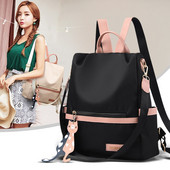 Kényelmes női hátizsák elülső zsebbel és kiegészítővel