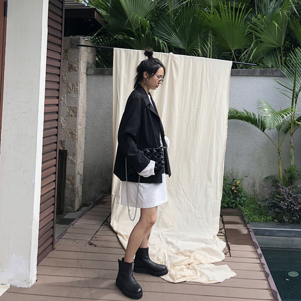 Stílusos női táska hosszú füllel