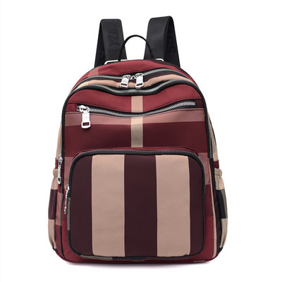 Spalvinga moteriška kuprinė su kišene priekyje