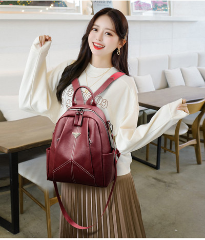 Moteriška laisvalaikio kuprinė iš eko odos su metaline apdaila