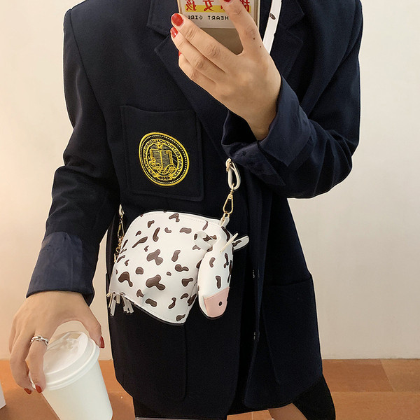 Alkalmi női táska cipzárral és hosszú füllel