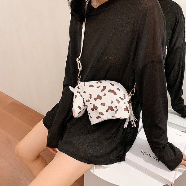 Alkalmi női táska cipzárral és hosszú füllel