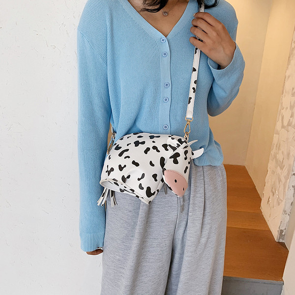 Alkalmi női táska cipzárral és hosszú füllel