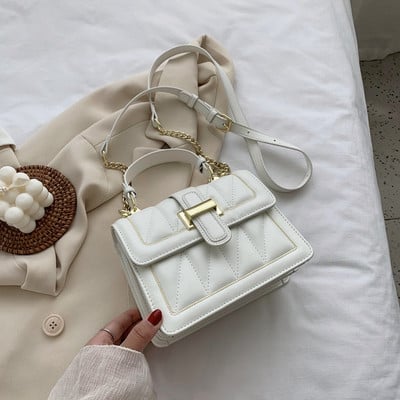 Stílusos női kézitáska csattal