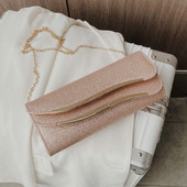 Elegáns női táska fém elemmel