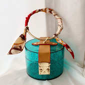 Γυναικεία τσάντα νέο μοντέλο με στρογγυλή λαβή