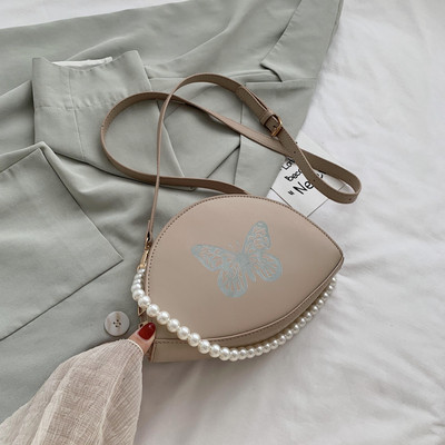 Naiste väike liblikaaplikatsiooniga kott