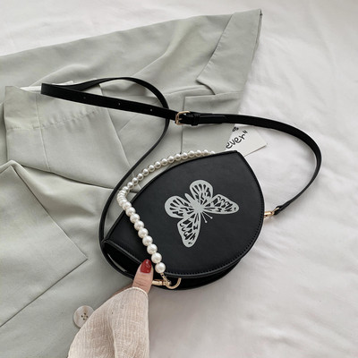 Naiste väike liblikaaplikatsiooniga kott