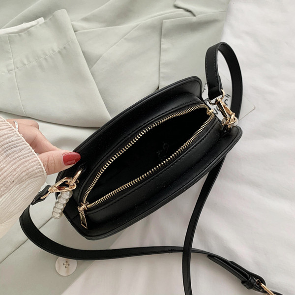 Naiste väike liblikaaplikatsiooniga kott