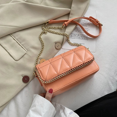 Modern női ökobőr táska fém fogantyúval