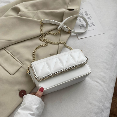 Modern női ökobőr táska fém fogantyúval