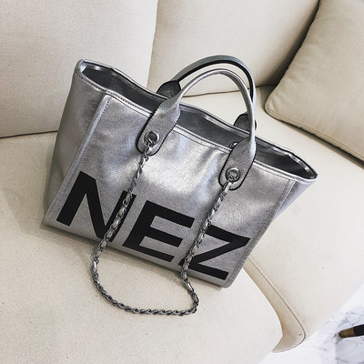 Női táska széles modell felirattal