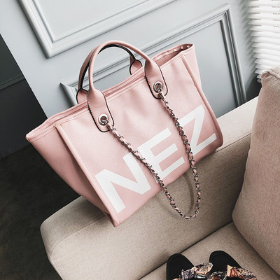 Női táska széles modell felirattal