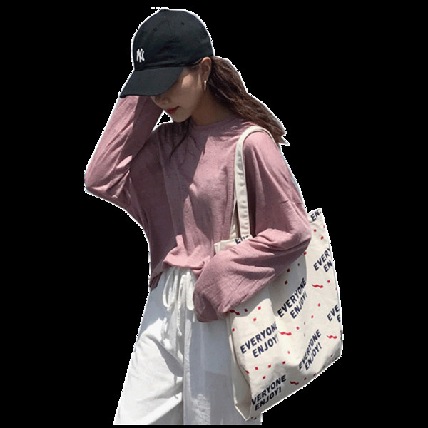 Naiste tekstiilist kirjadega õlakott