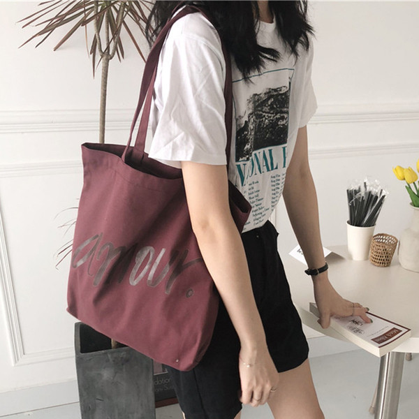 Alkalmi textil válltáska felirattal