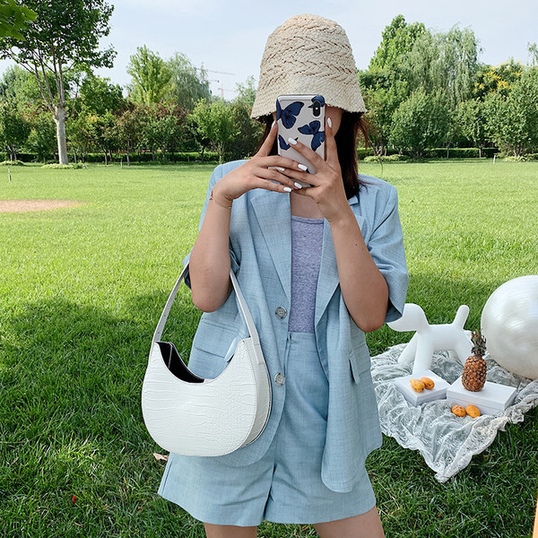 Casual γυναικεία τσάντα από οικολογικό δέρμα με κοντή λαβή