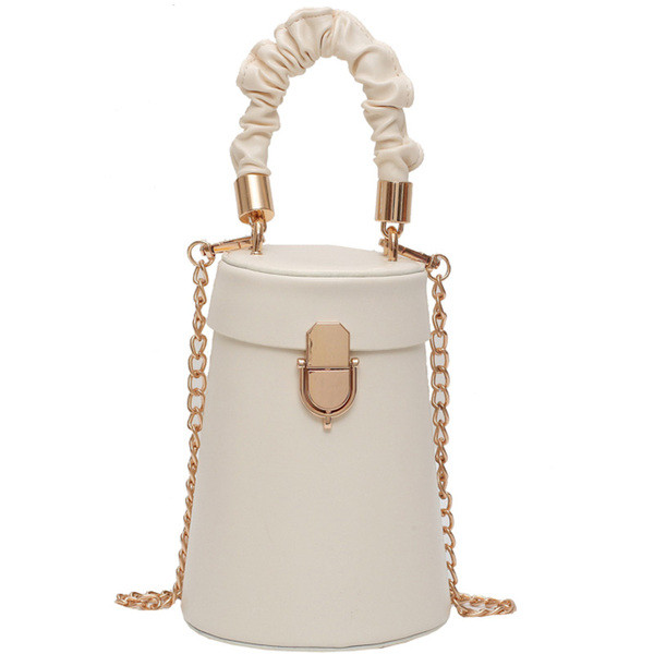 Stiilne metallist sangaga ümara kujuga naistekott