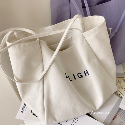 Alkalmi textil női válltáska felirattal