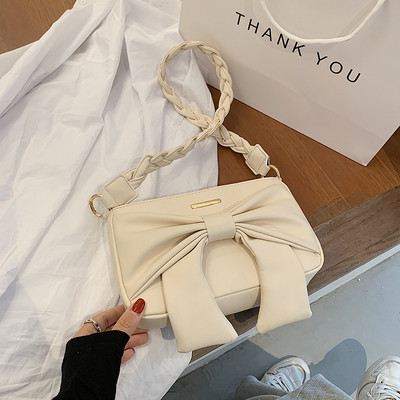 Női alkalmi táska hosszú füllel, öko bőrből