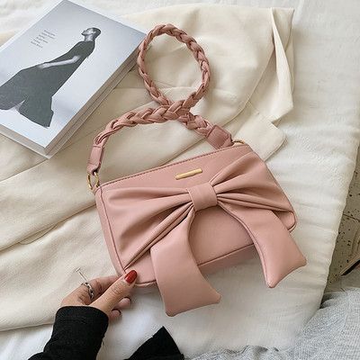 Női alkalmi táska hosszú füllel, öko bőrből