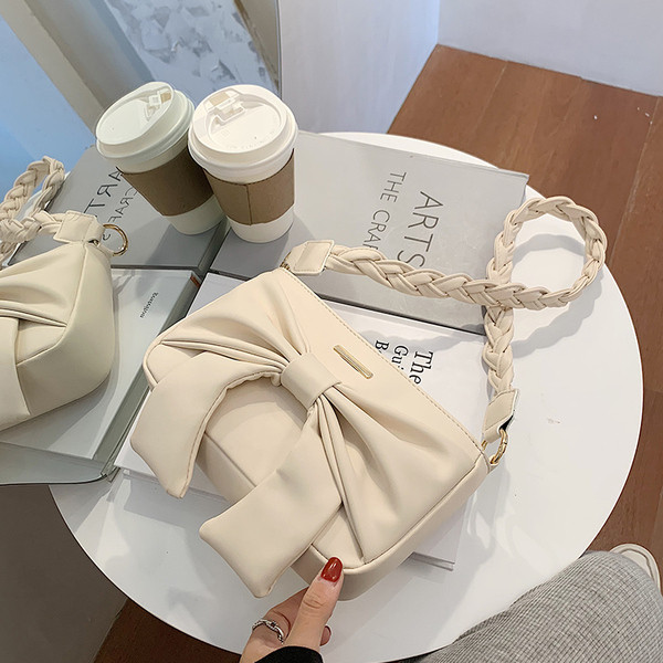 Női alkalmi táska hosszú füllel, öko bőrből