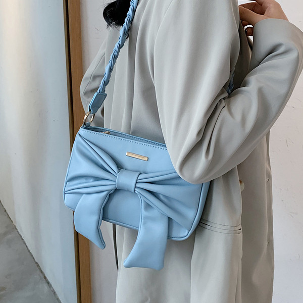 Női alkalmi táska hosszú füllel, öko bőrből