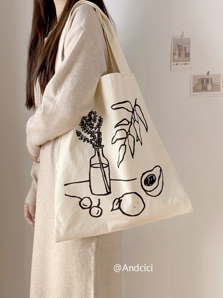 Bézs színű női válltáska hímzéssel