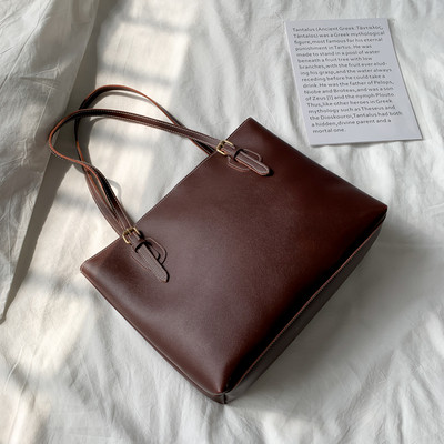 Öko-nahast stiilne õhukeste sangadega naistekott