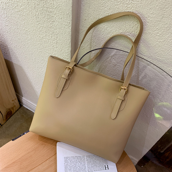 Öko-nahast stiilne õhukeste sangadega naistekott