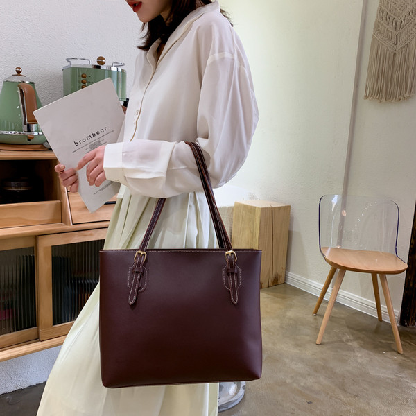 Öko-nahast stiilne õhukeste sangadega naistekott