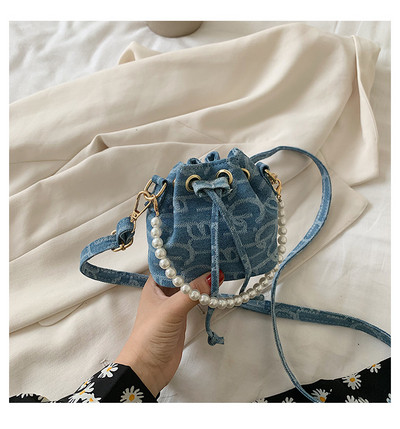 Stílusos női kerek válltáska dekorgyöngyökkel