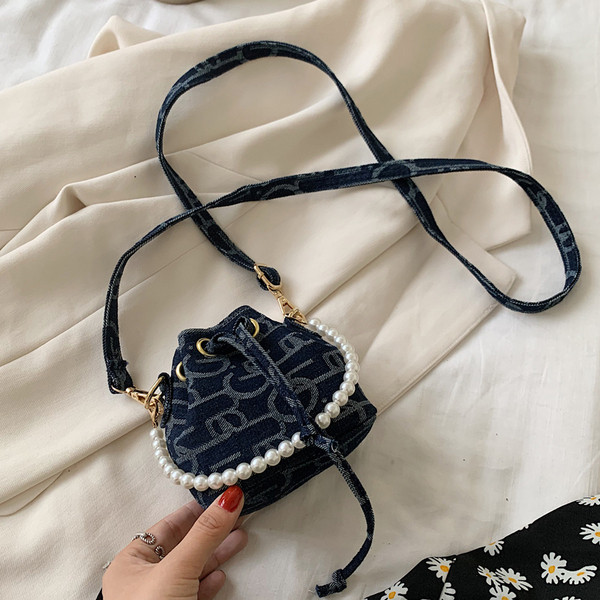 Stílusos női kerek válltáska dekorgyöngyökkel