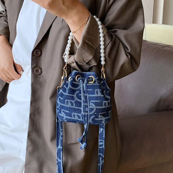 Stílusos női kerek válltáska dekorgyöngyökkel