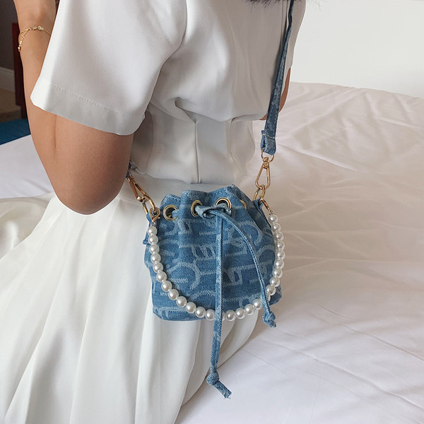 Stílusos női kerek válltáska dekorgyöngyökkel