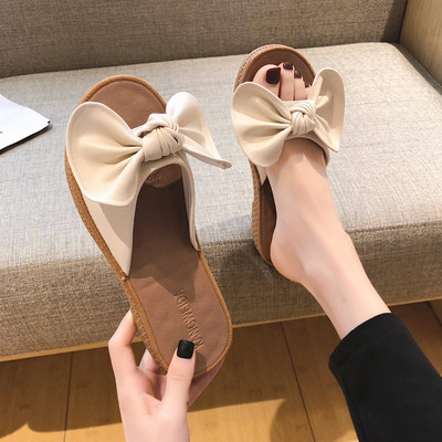 Naiste vabaaja sussid lameda talla ja ökonahast paelaga