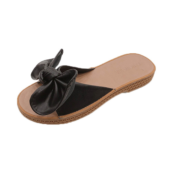 Naiste vabaaja sussid lameda talla ja ökonahast paelaga