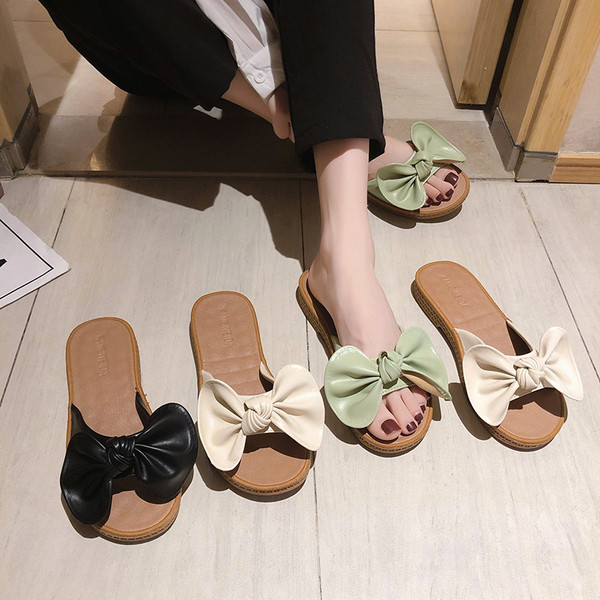 Naiste vabaaja sussid lameda talla ja ökonahast paelaga