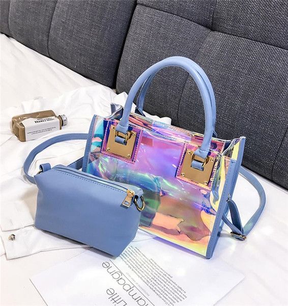 Fényes hatású kis táska két fogantyúval