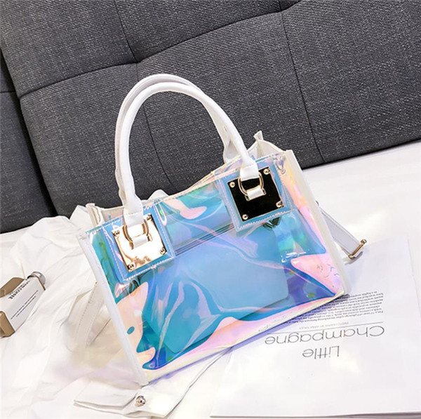 Fényes hatású kis táska két fogantyúval