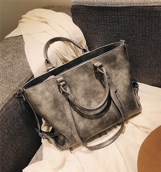 Velika svakodnevna torba od eko kože sa patentnim zatvaračima