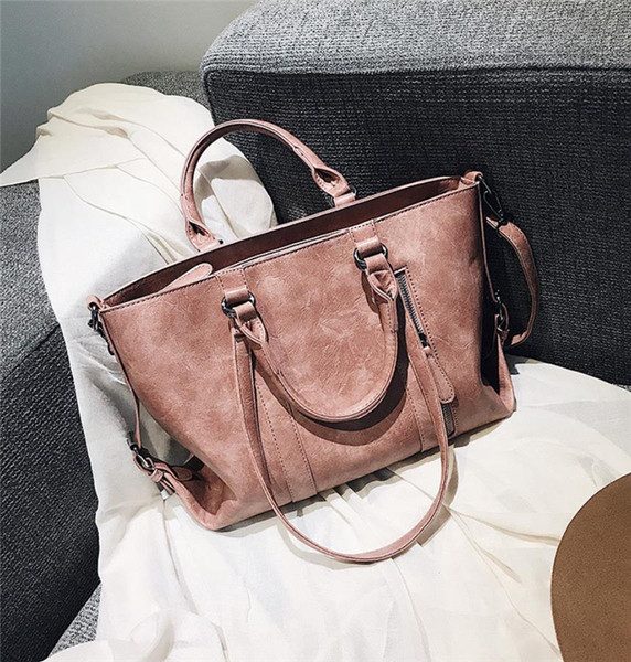 Velika svakodnevna torba od eko kože sa patentnim zatvaračima