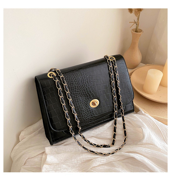 Női mindennapi táska eko bőrből, hosszú füllel, fém rögzítéssel