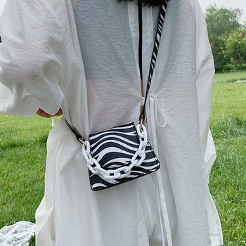 Γυναικεία μοντέρνα μίνι τσάντα με άνιμαλ πριντ