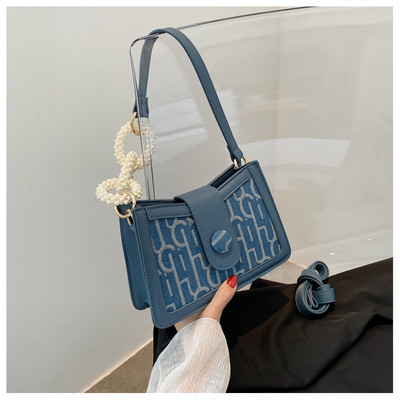 Μοντέρνα γυναικεία τσάντα από οικολογικό δέρμα με πέρλες