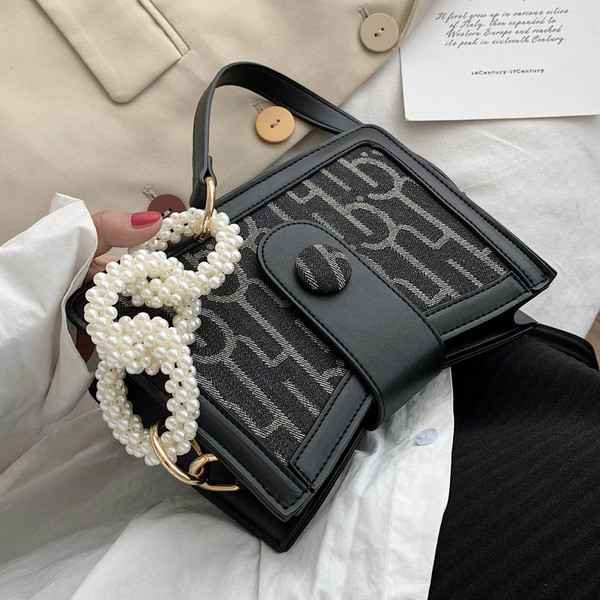 Μοντέρνα γυναικεία τσάντα από οικολογικό δέρμα με πέρλες