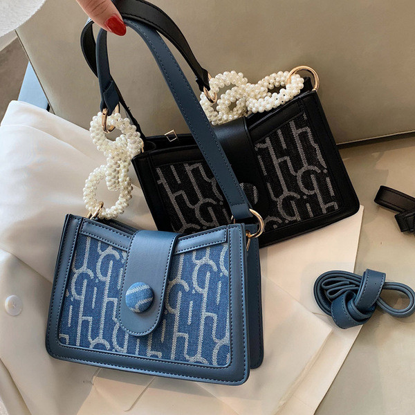 Μοντέρνα γυναικεία τσάντα από οικολογικό δέρμα με πέρλες