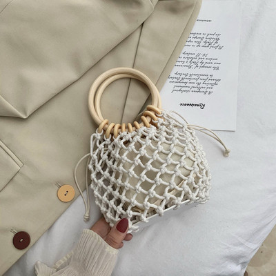 Γυναικεία μίνι πλεκτή τσάντα με στρογγυλές λαβές