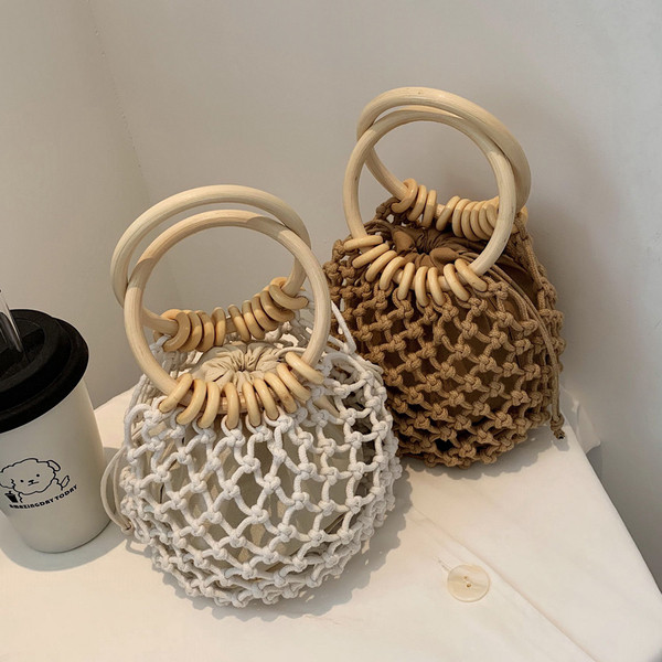 Γυναικεία μίνι πλεκτή τσάντα με στρογγυλές λαβές