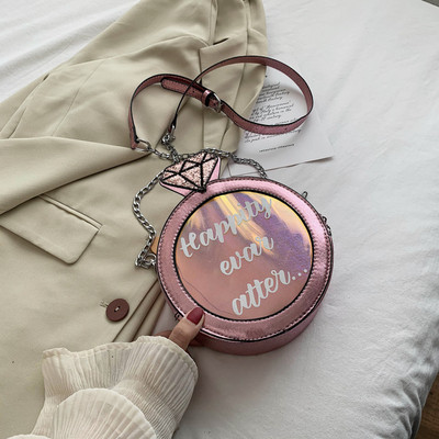 Γυναικεία στρογγυλή τσάντα από οικολογικό δέρμα με επιγραφή